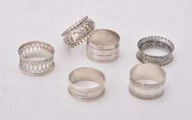 A collection of silver napkin rings