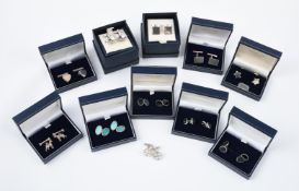 A collection of silver cufflinks