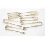 A pair of silver asparagus tongs by Mappin & Webb