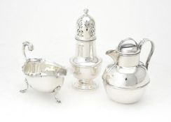 A silver Jersey cream jug by J. Collyer & Co. Ltd.