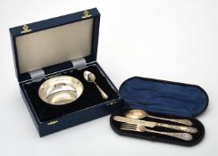 A cased silver christening bowl and spoon by W. I. Broadway & Co.