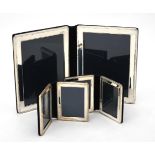 Three silver mounted folding double photo frames by Kitney & Co.