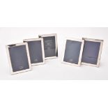 Five silver mounted rectangular photo frames by Kitney & Co.