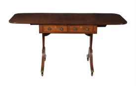 A Regency mahogany and line inlaid sofa table