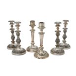 A set of four electro-plated candle sticks