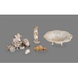 Y A Japanese Ivory Group of a man and boy seated on a large tree trunk