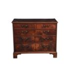 A George III mahogany and inlaid chest of drawers