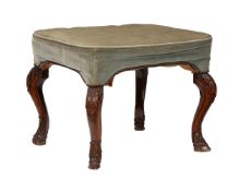 A carved walnut and upholstered stool