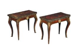 Y A near pair of Napoleon III red tortoiseshell and boule inlaid card table