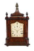 A Victorian mahogany and brass inlaid quarter chiming bracket clock