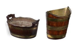A George III mahogany and brass bound bucket