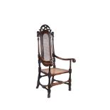 A William & Mary carved fruitwood armchair