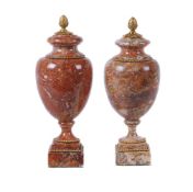 A pair of French Breccia marble and gilt metal mounted ornamental urns