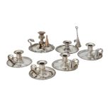 A set of four electro-plated circular chambersticks by Elkington & Co.