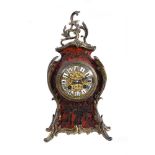 Y A tortoiseshell and gilt metal mounted mantel clock
