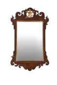 A George III fret framed wall mirror