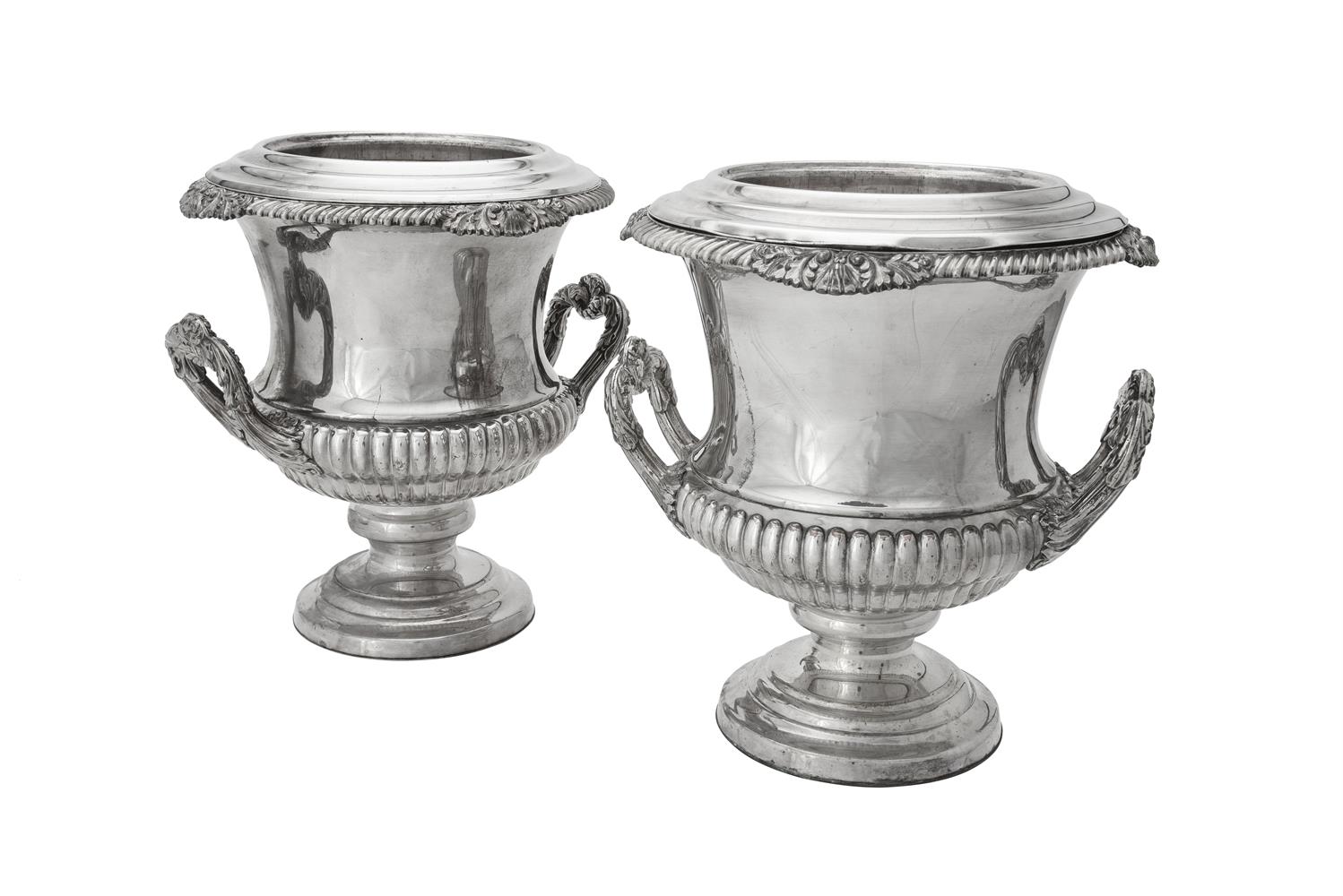 A pair of electro-plated campana urn shaped wine coolers