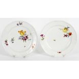 Two Meissen (Punkt) plates; and a Nymphenburg part set