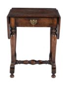 An early 20th century walnut side table in the William & Mary style