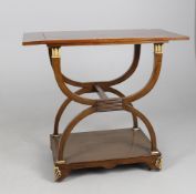 A French Empire style mahogany and parcel gilt side table