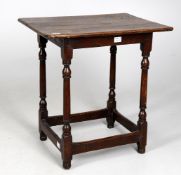 A small early 18th century oak side table