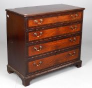 An early 19th century mahogany and crossbanded chest