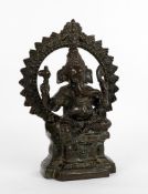 An Indian bronze group of Ganesh