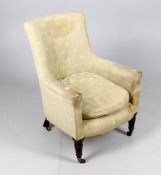 A Victorian tub chair with squab cushion