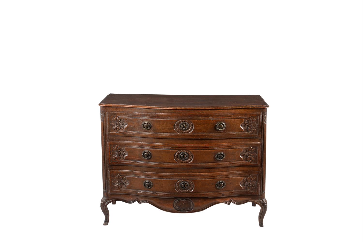 A Louis XV oak commode