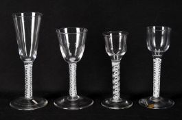 Four 18th century glasses including an opaque twist ale flute