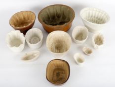 Twelve various pie and jelly moulds