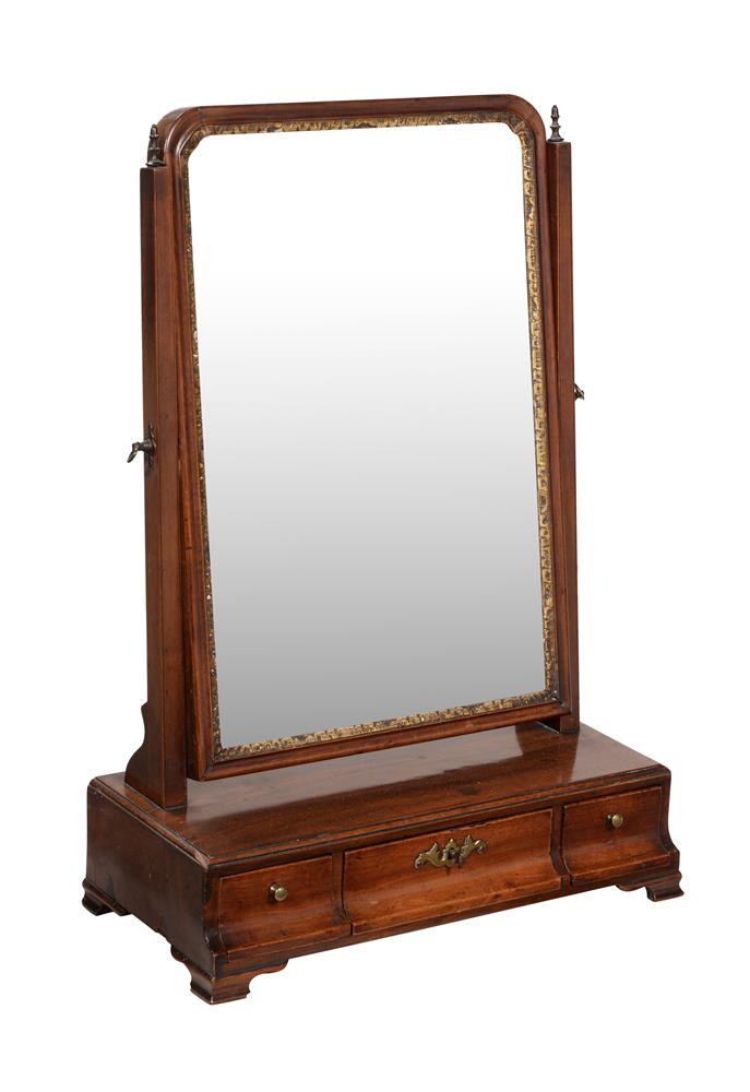 A George II mahogany and parcel gilt dressing mirror