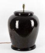 A large modern glazed ceramic table lamp