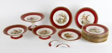 A late 19th century English porcelain claret ground ornithological dessert service