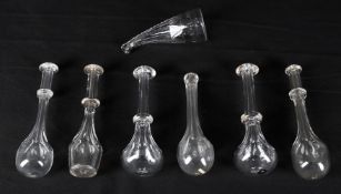 Seven glass toddy lifters including a late 18th century cornucopia shaped example