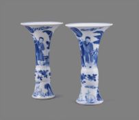 A fine pair of Chinese porcelain blue and white small beaker vases