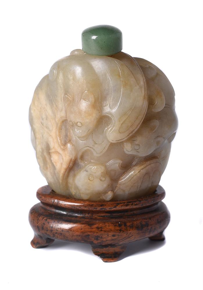 A Chinese celadon jade 'Five bats' snuff bottle