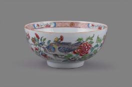 A good Chinese porcelain Famille Rose circular bowl painted with a large bird