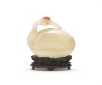 A Chinese small white jade 'crane' box and cover