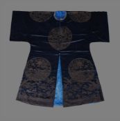A rare and unusual Chinese silk brocade robe