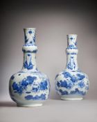 A pair of Chinese 'Seven Scholars in a Bamboo Grove' blue and white bottle vases