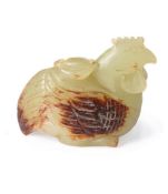 A good Chinese yellow jade and russet carving of a crouching chicken