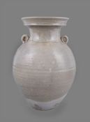 A large Chinese pale celadon glazed two-handled ovoid jar