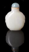 A Chinese pale celadon jade snuff bottle
