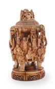Y A well carved Chinese ivory censer cover and stand