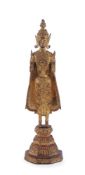 A Thai gilt-bronze standing Buddha