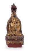 A Burmese paste-embellished gilt and lacquer wood figure of Buddha Muchalinda