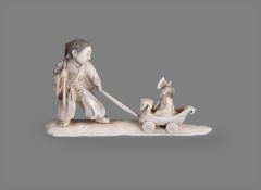 Y A Japanese Ivory Okimono of a young man standing on a shaped base