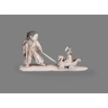 Y A Japanese Ivory Okimono of a young man standing on a shaped base