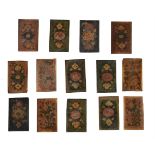 A group of 14 wooden floral book binding boards